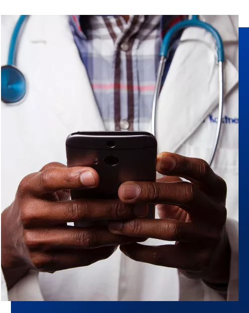 Healthcare person using his mobile phone