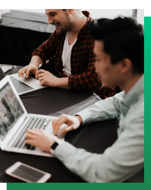 Two employees working together